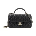 CHANEL MINI FLAP BAG WITH TOP HANSLE IN PEARLY LAMBSKIN BLACK