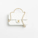 SMALL FLAP BAG WITH TOP HANDLE